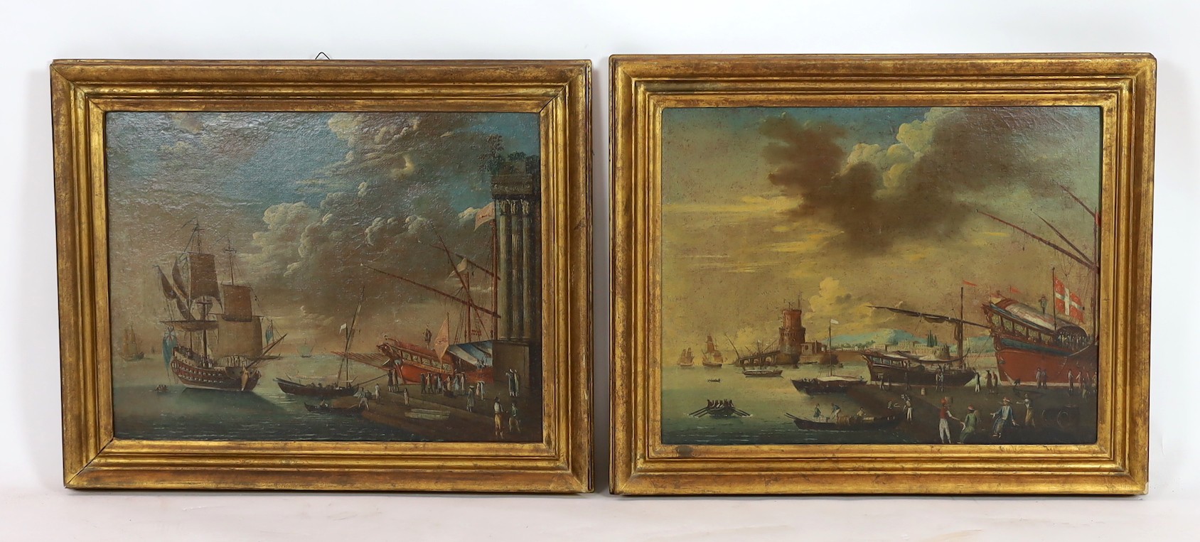 After Francesco Guardi (Italian, 1712-1793), Merchant vessels and other shipping along the shore, including an English warship and merchants barge, pair of oils on canvas, 46 x 60cm